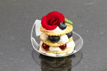 Canape desserts and snack in plastic cups 
