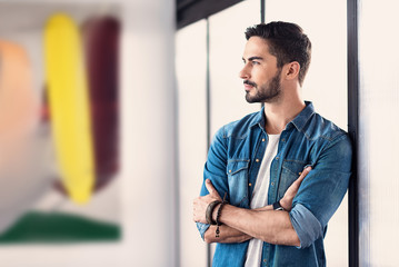 Thoughtful serious man glancing aside