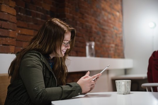 Female executive using digital tablet in office