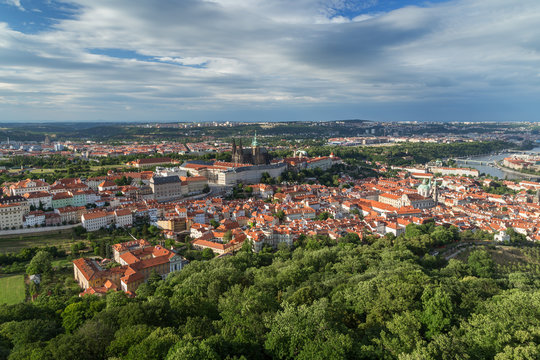 View of the Prague Castle and old buildings at the Mala Strana District (Lesser Town) and Petrin Hill in Prague, Czech Republic, from above.
