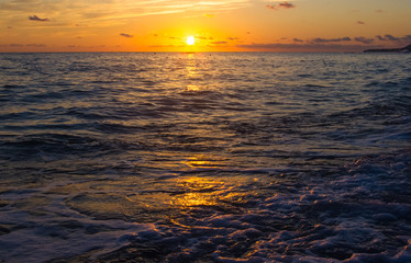 Amazing sea sunset, the sun, waves, clouds