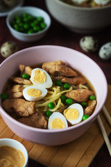 Ramen soup with eggs and green peas
