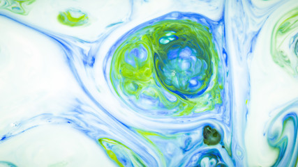 Closeup abstract color mixing of acrylic for use as background. Acrylic texture with marble pattern 