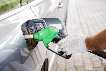 Automobile refueling with gasoline