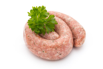 Raw sausages with herbs and spices.
