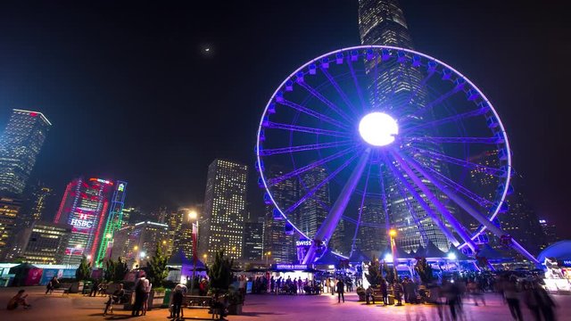 Hong Kong Wheel at night Famous place on the quay Timelapse
