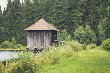 lake dwelling in idyllic landscape