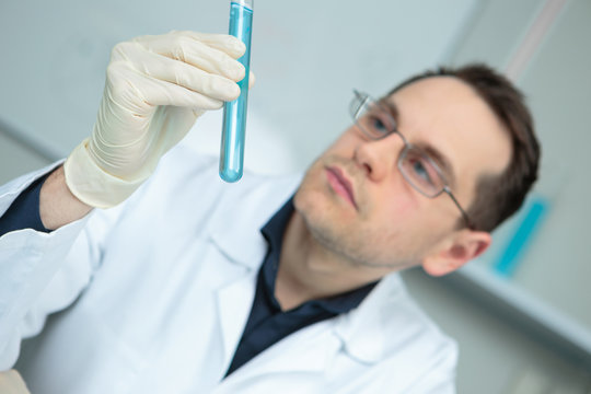 researcher working with a pipette