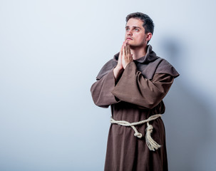 Portrait of Young catholic monk