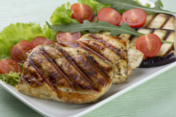 Grilled chicken steak grilled with vegetables