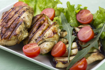 Grilled chicken steak grilled with vegetables