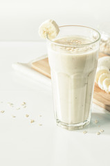 Useful smoothies with a banana and oatmeal. Banana milkshake with oats.