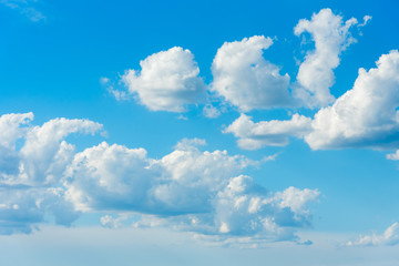 Naklejka na ściany i meble clouds against a blue sky
