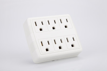 White multiple electric socket adapter isolated on white background.