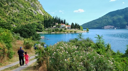 Grandfather And Grandchild Walking On Charming Coastal Of Kotor Bay - 163081492