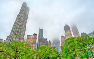 Fototapeta na wymiar Skyscrapers of Manhattan in the fog - New York City