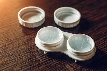 Obraz na płótnie Canvas Containers for contact lenses