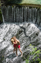 couple kissing in nature