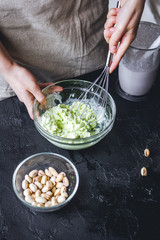 organic ice cream homemade process on dark background with hands