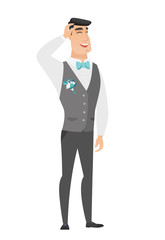 Young caucasian bridegroom laughing.