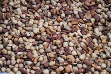 Background nuts, walnut, pistachios, peanuts, hazelnut, Indian nut, on a bunch, healthy food
