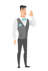 Caucasian groom calling for help.