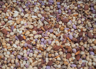 Background nuts, walnut, pistachios, peanuts, hazelnut, Indian nut, on a bunch, healthy food