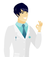 Young asian doctor showing ok sign.