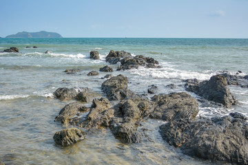 Fototapeta na wymiar rock in the sea for background
