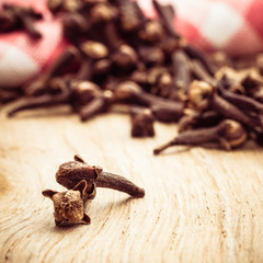 Spice cloves on kitchen table
