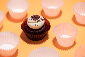 Birthday cupcake against a yellow background