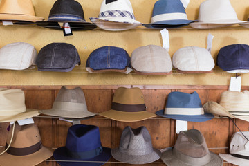 fedora hats hanging on the wall of country shop