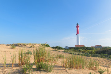 Fototapeta na wymiar Lighthouse at the beach