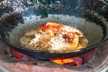 Fried shrimp with salt on pan
