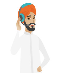 Hindu customer service operator in headset.