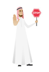 Muslim businessman holding stop road sign.