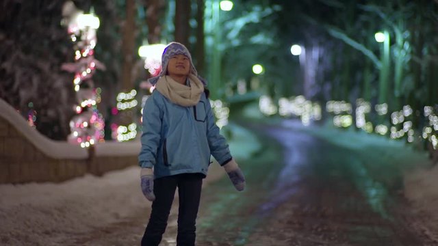 Little Girl Spins In Circle, Slowly, Taking In A Magical Winter Wonderland (Slow Motion)