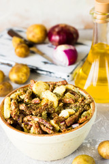 Bavarian salad with smoked meat on a light background