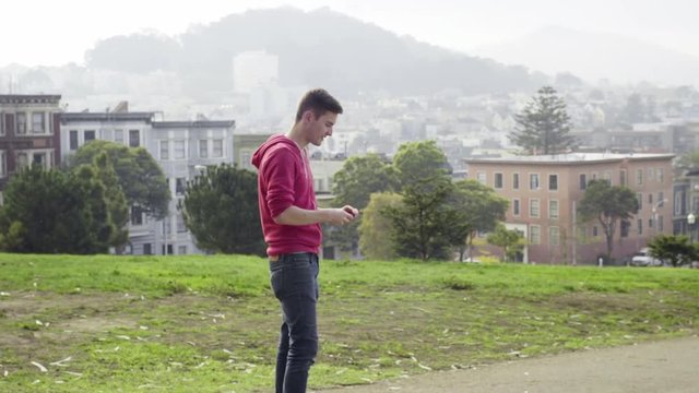 Man Takes A Selfie With San Francisco Hills In The Background