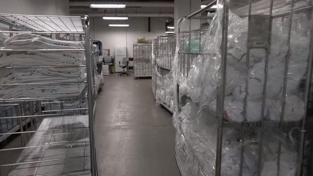 Warehouse with linen supply carts