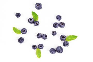 Fresh blueberry with leaf on white background