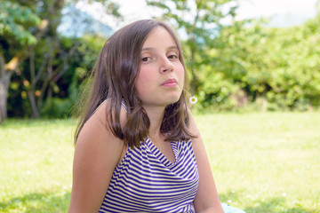 Fototapeta premium portrait of pretty beautiful young teenager, outdoors