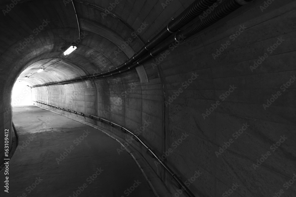 Aufkleber light at the end of stone tunnel