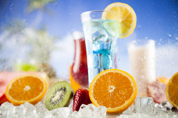 Summer drink with blur beach on background