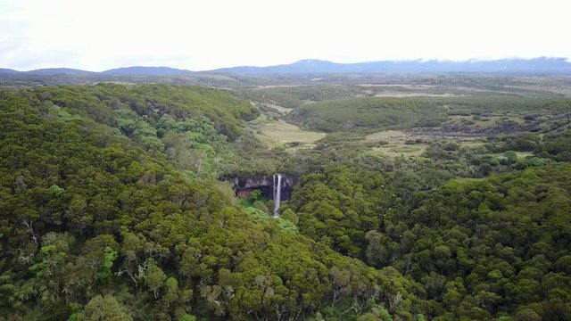 Waterfall in mountain river. Aerial drone footage. Aberdares National Park, Kenya