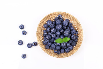 Fresh blueberry with leaf on white background