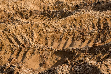 Clay and sand in the quarry. Beautiful unusual background similar to the surface of the planet Mars or the moon