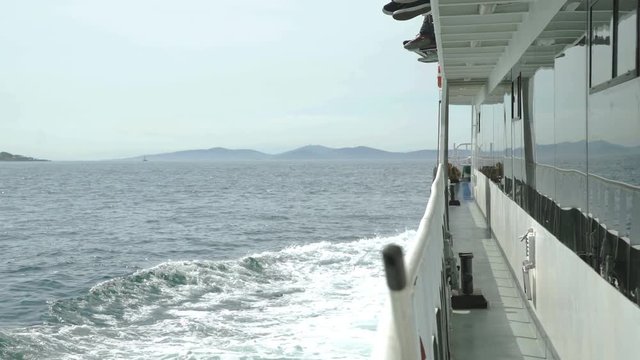 View from boat. Foot of passengers