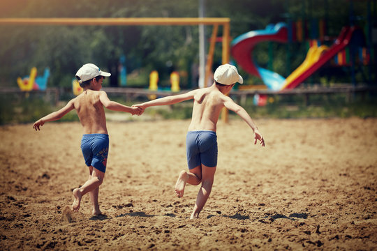 Kids Running On The Beach