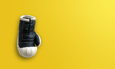 Boxer gloves used on yellow background